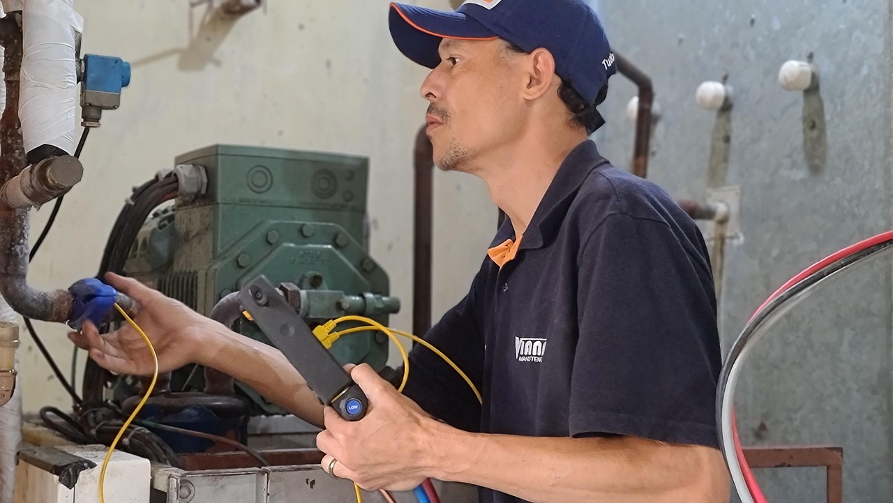HVAC technician tools and refrigerant gauges (equipment shown for reference)